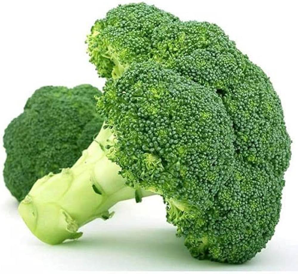 Calabrese Broccoli seeds growing into robust green heads with tight florets, ideal for steaming or stir-frying