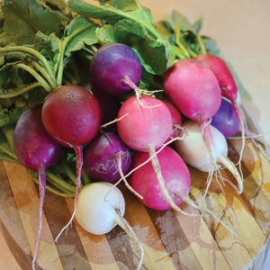 sliced colorful radishes adding crunch and color to salads

